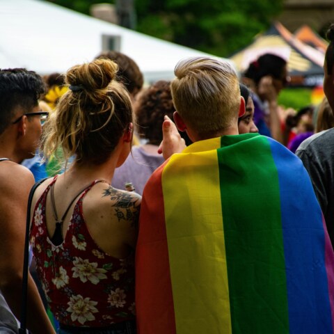 How can healthcare systems better address the needs of LGBTQ+ patients?