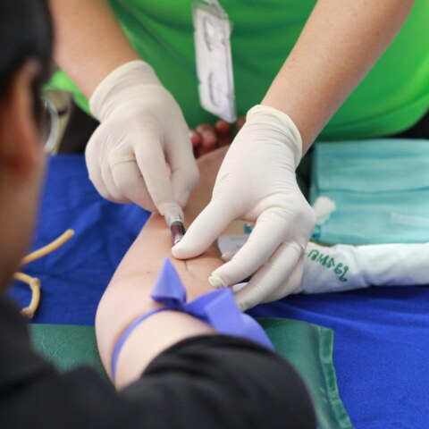 What are the potential benefits and drawbacks of universal healthcare coverage?