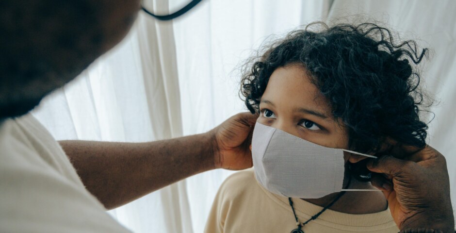 What are the underlying causes of mucus changing color to yellow and green, such as bacterial infections, viral illnesses, environmental pollutants, and allergic reactions, and how do these factors influence the body's immune response and inflammatory processes?