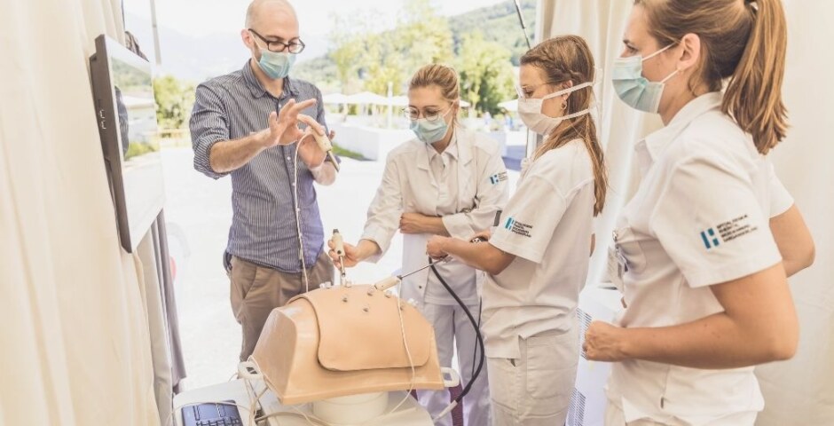 How can training programs for healthcare professionals be designed to effectively address the evolving needs of the healthcare industry while ensuring the highest standards of patient care?