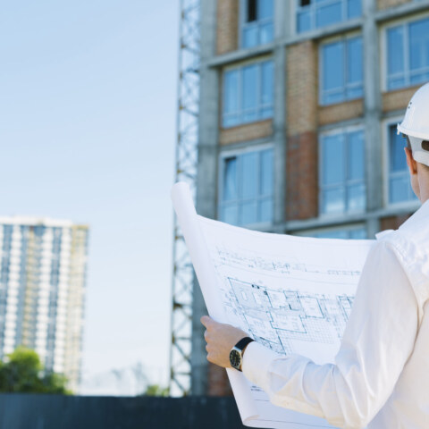 How do you manage conflicts or clashes between mechanical and plumbing layouts during the drafting process, particularly in tight or space-constrained builds?