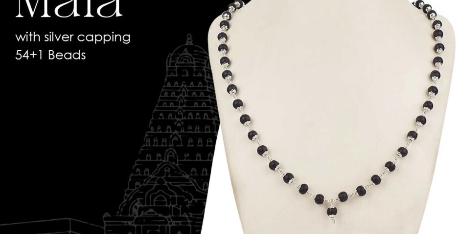 What are the spiritual benefits of wearing a Karungali Mala?